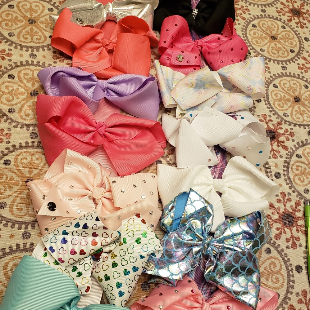 14 JoJo Siwa bows with 2 holders